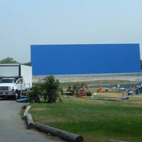 Opruimen van de set/ grootste blauwe scherm ter wereld